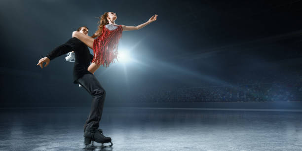 istock Figure skating. Ice skaters couple 932241662