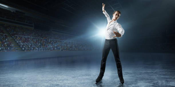 istock Figure skating. Male Ice skater 932241724