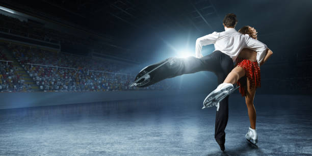 istock Figure skating. Ice skaters couple 932241746