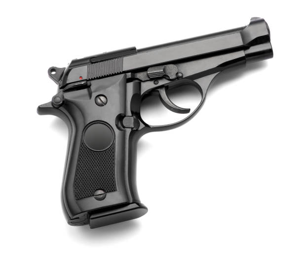 istock Low Angle View Of Gun Over White Background 932242310
