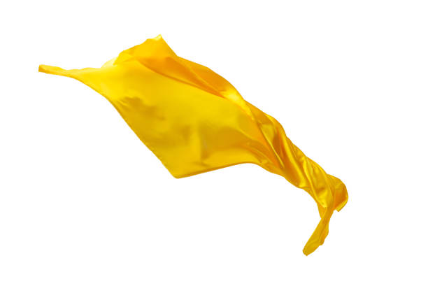 istock Smooth elegant transparent yellow cloth separated on white background 932244144