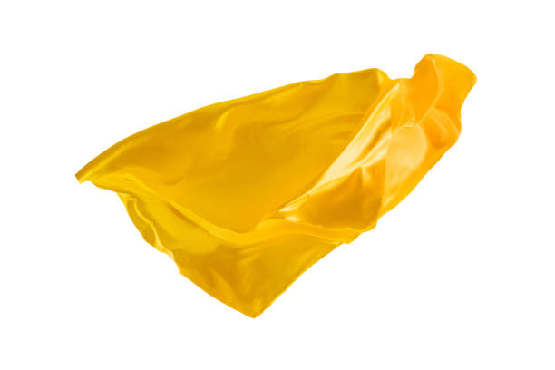 istock Smooth elegant transparent yellow cloth separated on white background 932244394