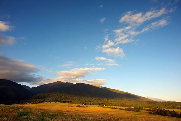 istock moutians in sunset with diagonally clouds 93224801