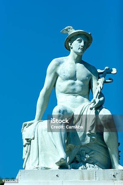 A Light Blue Statue Of Hermes Outside On A Clear Day Stock Photo - Download Image Now