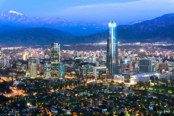 Panoramic view at night of Santiago de Chile Panoramic view at night of Santiago de Chile with The Andes Mountain Range in the back sanhattan stock pictures, royalty-free photos & images
