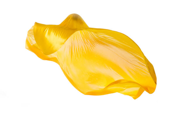 istock Smooth elegant transparent yellow cloth separated on white background 932262488