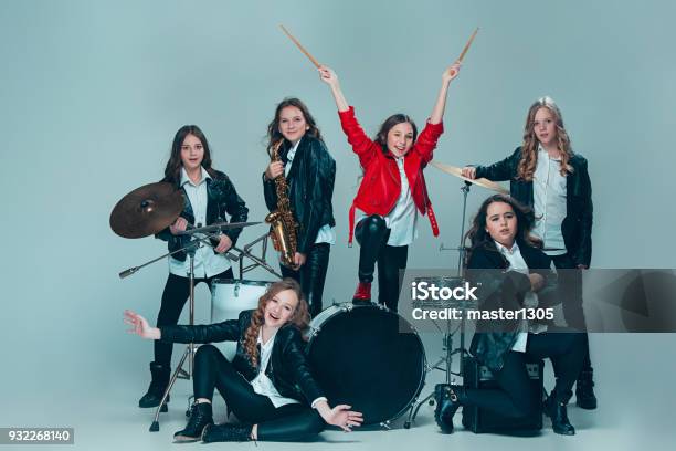 The Teen Music Band Performing In A Recording Studio Stock Photo - Download Image Now