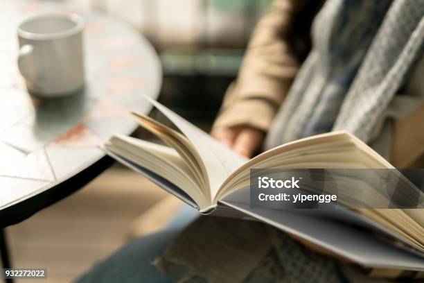 Reading Book While Drinking Coffee Stock Photo - Download Image Now - Reading, Book, Open