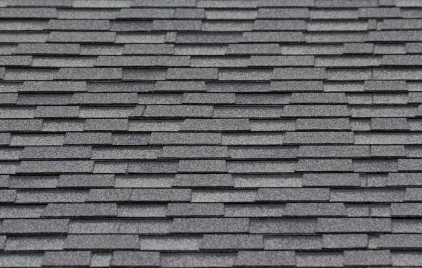 istock grey and black roof shingles background 932275908