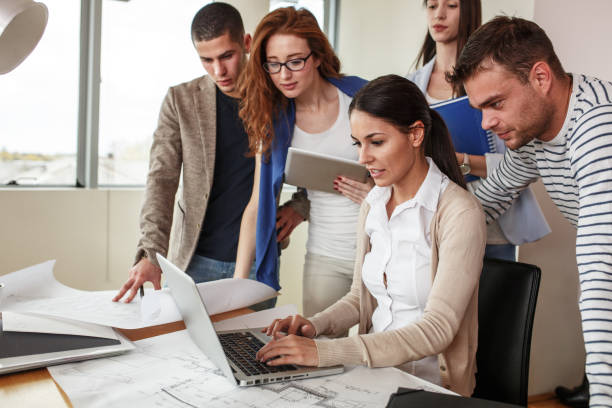 istock Group of business people working on new project . 932278544