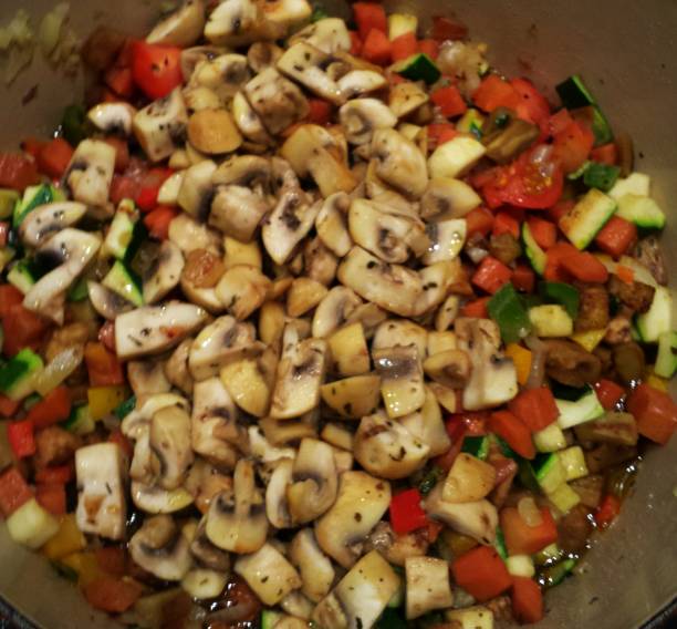 istock Sauteed vegetables pepper tomato mushroom courgette onion 932278918