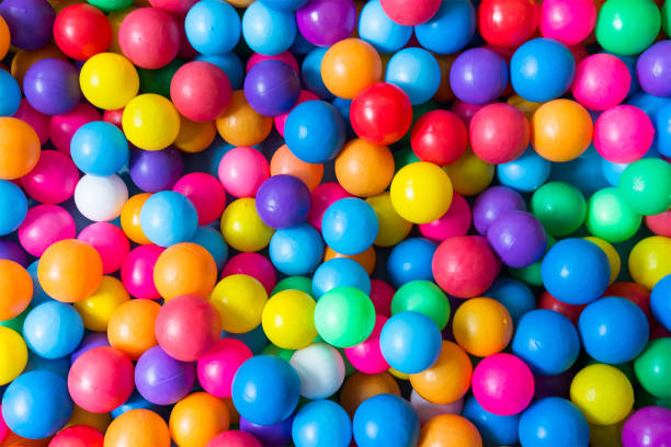 istock colorful plastic balls background, toy balls for kid 932283594