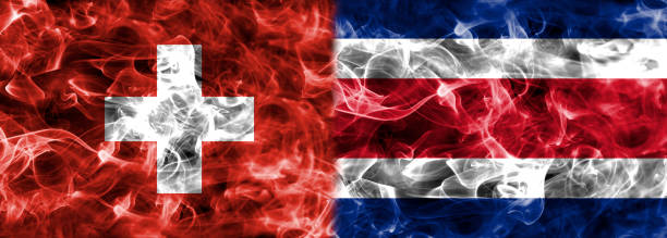 istock Switzerland vs Costa Rica smoke flag 932289186