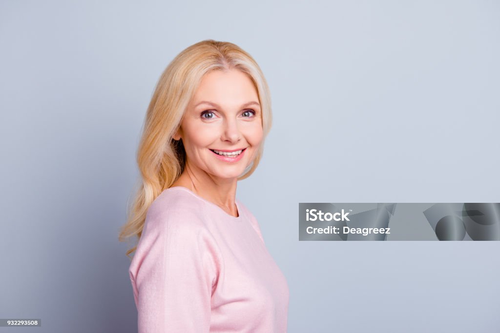 Cream lotion balm mask salon purity procedure people collagen freshness concept. Close up portrait of beautiful pretty cute lovely mature lady looking at camera isolated on gray background copy-space Botulinum Toxin Injection Stock Photo