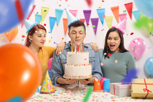 istock Teenagers celebrating a birthday 932293686