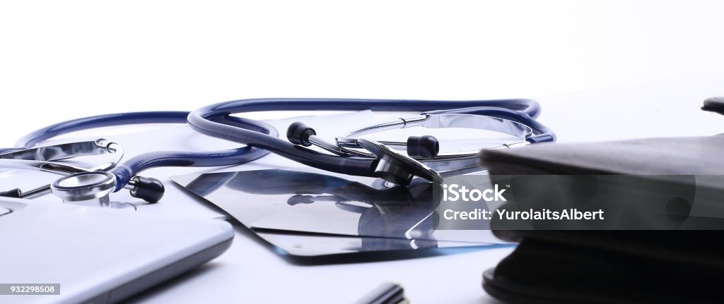 closeup.stethoscope at the workplace of the doctor closeup.stethoscope at the workplace of the doctor.the concept of health Belarus Stock Photo