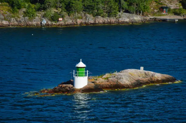 Photo of Lighthouse located on islet of Stockholm Archipelago in Baltic Sea, Sweden