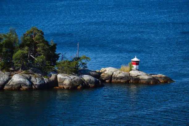 Photo of Lighthouse located on islet of Stockholm Archipelago in Baltic Sea, Sweden