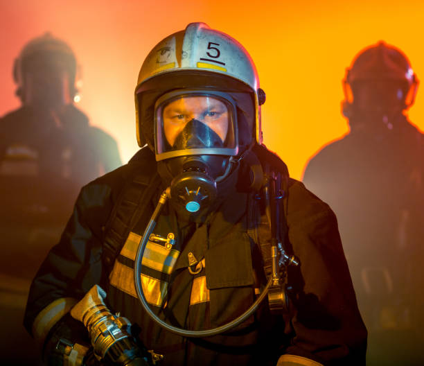 istock Fireman in Full Firefighter Gear. Portrait 932299486