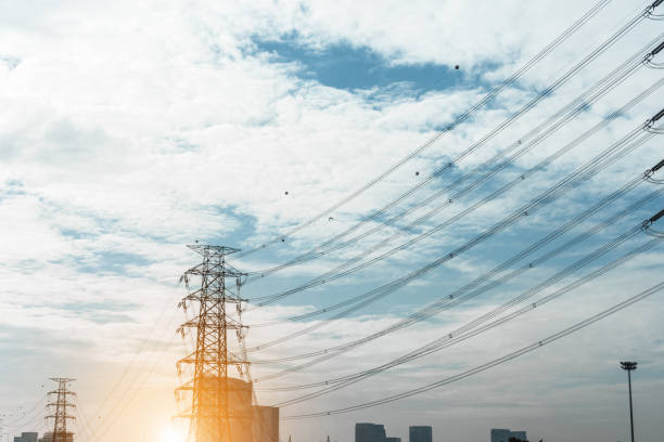 istock Electricity concept. Close up high voltage power lines station. 932302042