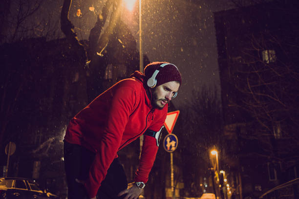 istock man working out in the snow 932303420
