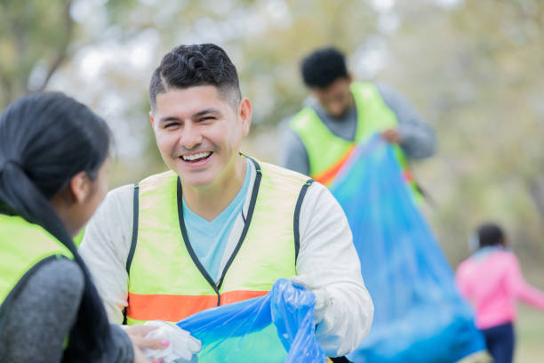 istock Volunteers during community cleanup event 932304006