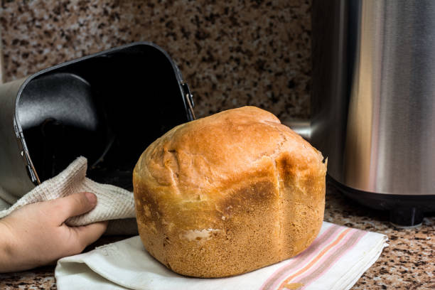 istock Homemade bread baked in a bread maker 932307206