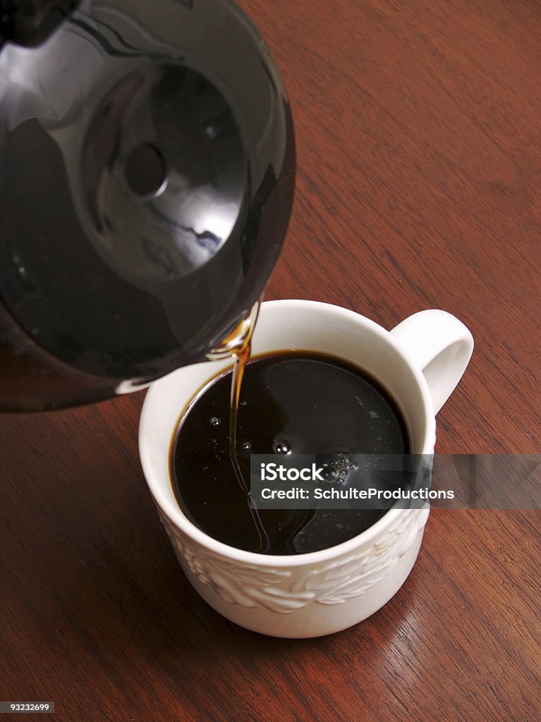 Coffee Pouring a cup of coffee. Black Color Stock Photo
