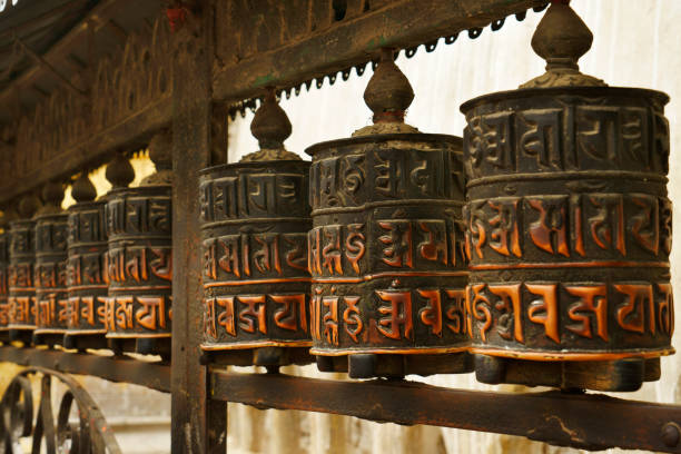 nepalese buddhistic prayer wheels at stupa of Swayambhunath temple Kathmandu Nepalese buddhistic prayer wheels next to the famous stupa on top of Swayambhunath temple (Monkey temple) in Kathmandu. Buddhism. Nobody. Asian culture, spirituality and religion. XXXL Sony Alpha 7R. prayer wheel nepal kathmandu buddhism stock pictures, royalty-free photos & images