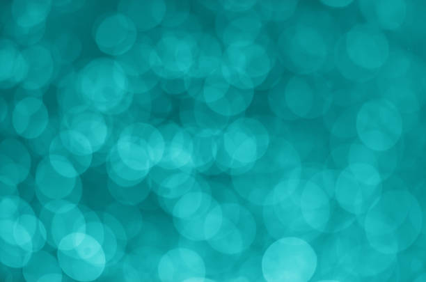 istock abstract gorgeous bright aqua blue bokeh background. 932331632