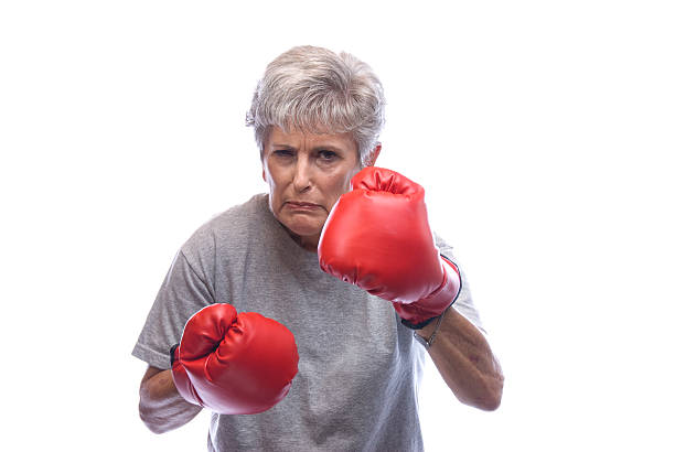 grand-mère avec gants de boxe - boxing glove sports glove isolated old photos et images de collection