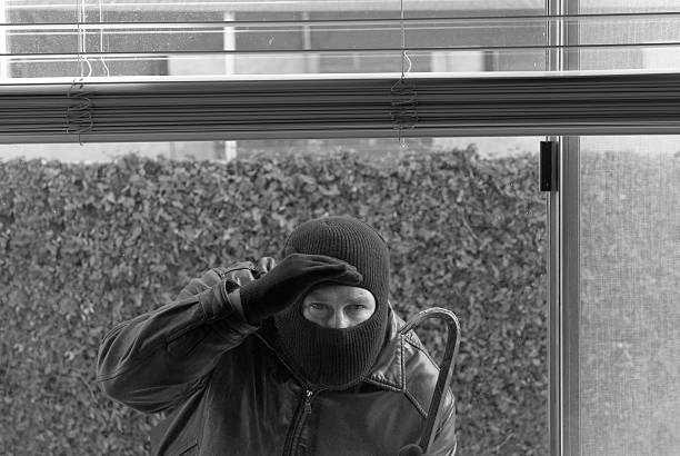 Robber and theif  burglary crowbar stock pictures, royalty-free photos & images