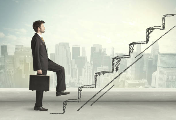 istock Business man climbing up on hand drawn staircase concept 932335656