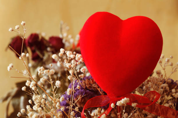 istock Heart shape and flower 932338386