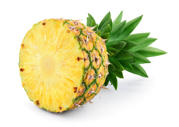 istock Pineapple half. Pineapple slice isolated on white. Pineapple with leaves. Full depth of field. 932358730