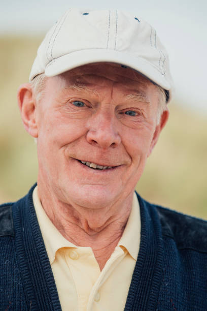 istock Elderly Man Smiling at the Beach 932362542