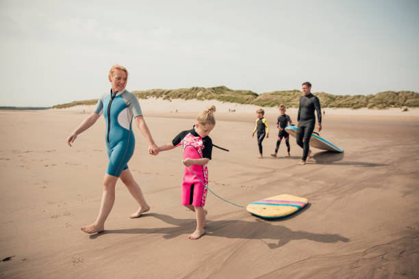 istock Family Surfing Holiday 932375774