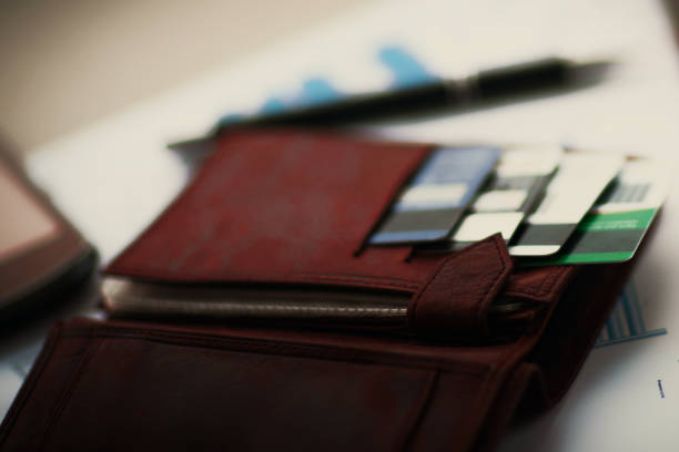 istock leather wallet with credit in discount cards 932380504