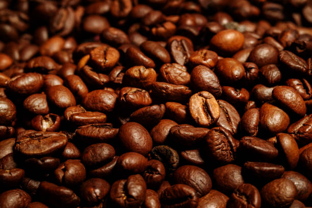 istock Coffee beans close-up. Beautiful saturated color 932380620