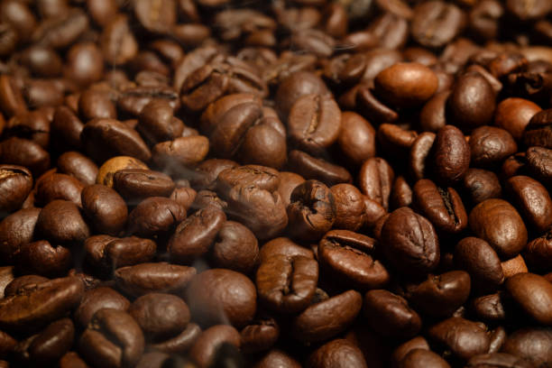 istock Coffee beans close-up. Beautiful saturated color 932380730