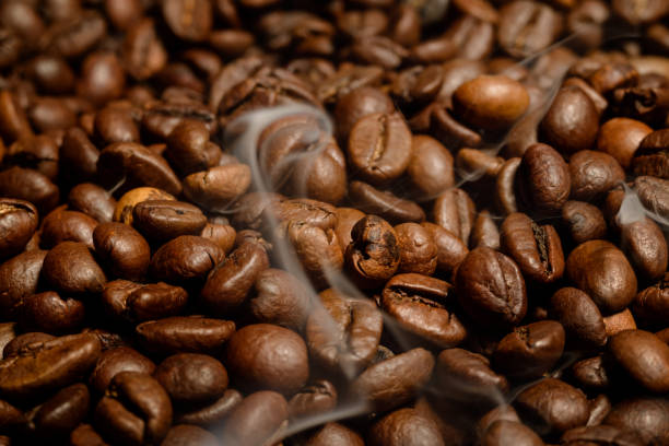 istock Coffee beans close-up. Beautiful saturated color 932380894
