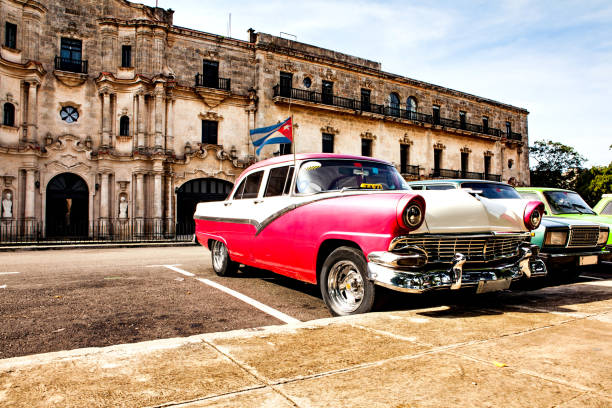 colorful vintage classic car parked in old havana - castro street imagens e fotografias de stock