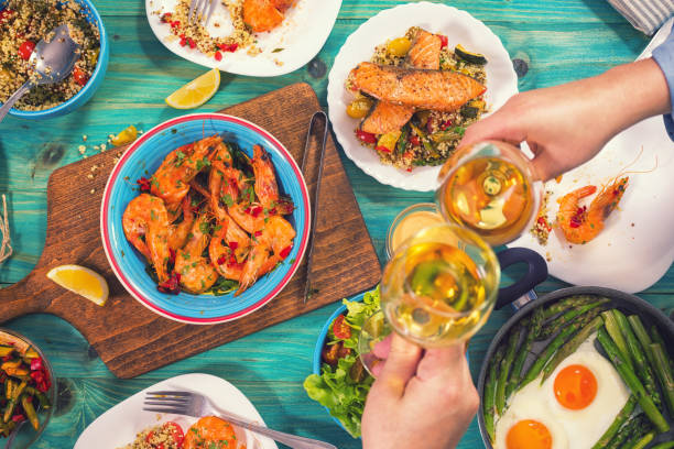 istock Young Family Having Lunch at Home 932393030
