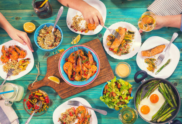 istock Young Family Having Lunch at Home 932393060