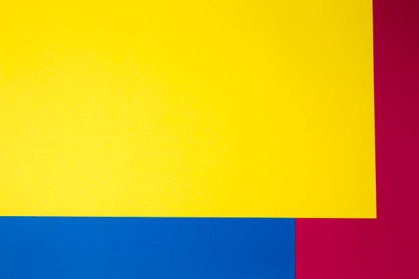 istock Color papers geometry flat composition background with yellow, red and blue tones 932393470