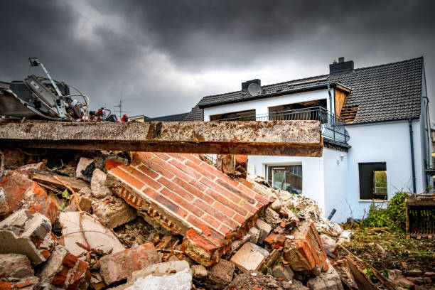 istock Demolishing houses 932396556