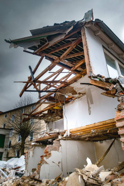 istock Demolishing houses 932396580
