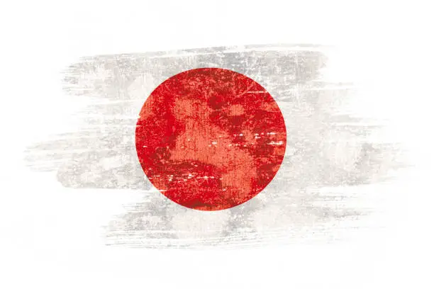 Photo of Art brush watercolor painting of Japan flag blown in the wind isolated on white background.