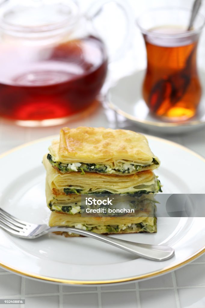 homemade su borek, turkish pie, feta cheese and parsley Börek Stock Photo