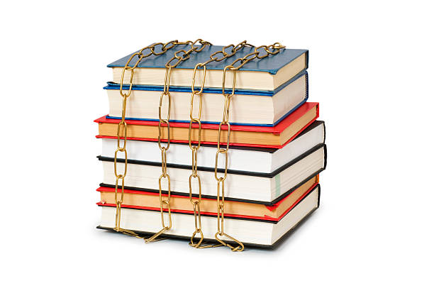 istock Censorship concept with books and chains on white 93241196